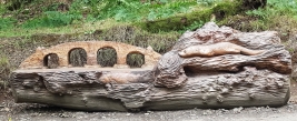 Wood carving commemorating the battle of Stirling Bridge by Iain Chalmers on the Wallace Way, Abbey Craig
