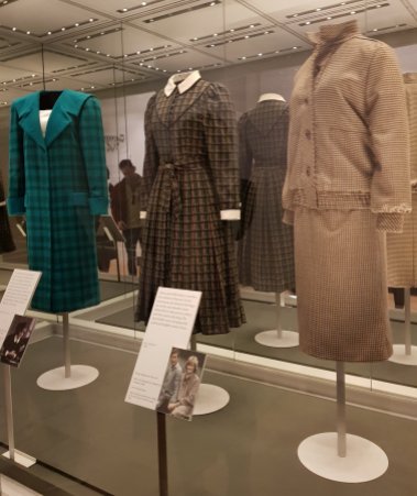 Left to right: an Emmanuel bold design from 1985 worn on an official visit to Italy, a Caroline Charles tartan day dress worn in 1982 for the Braemar Highland Games and the tweed suit worn during her honeymoon at Balmoral.