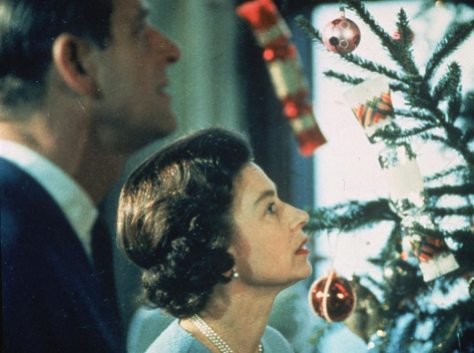 Queen Elizabeth II and the Duke of Edinburgh looking at their Christmas tree in 1969